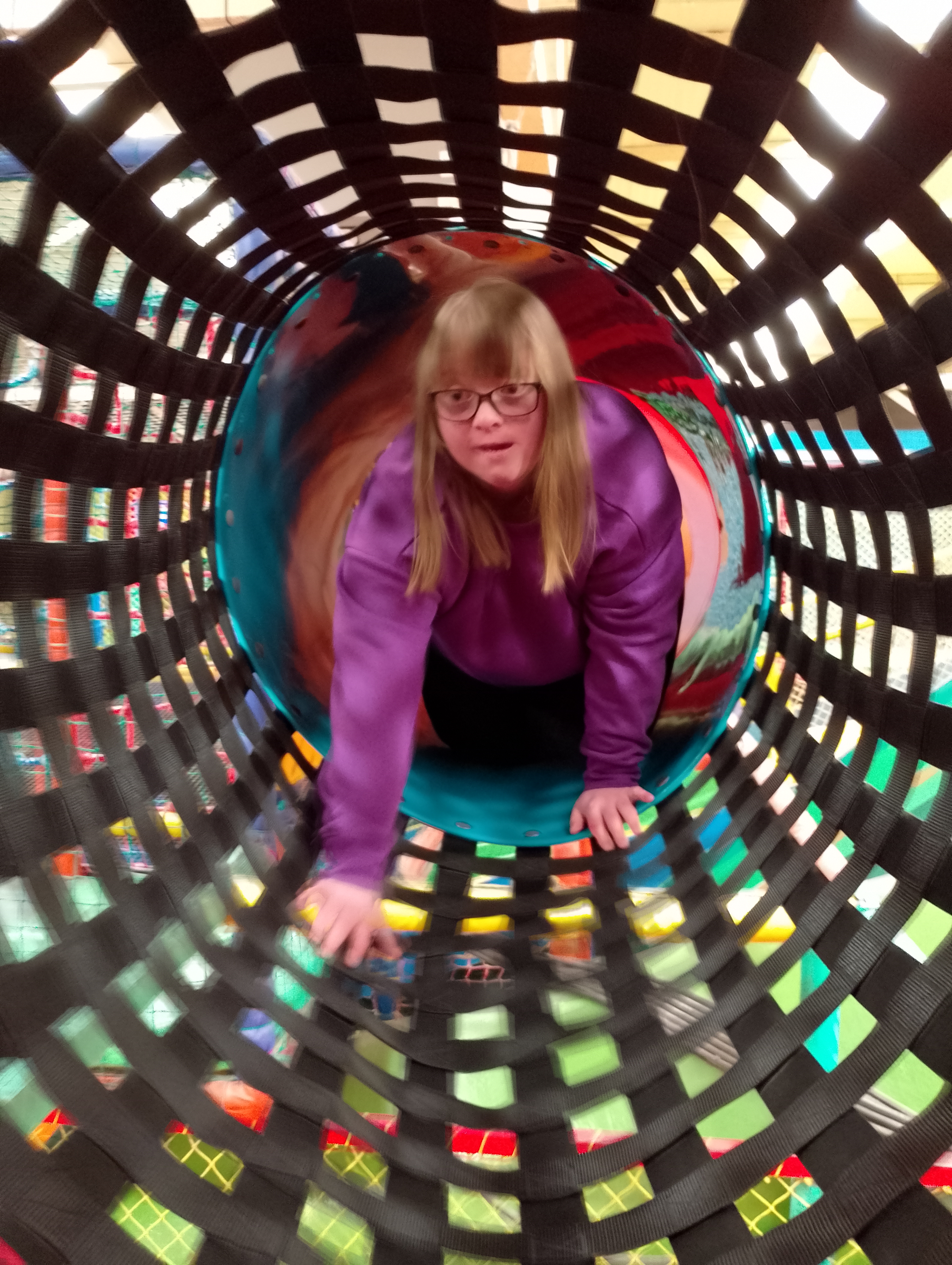 Having fun in a play tunnel