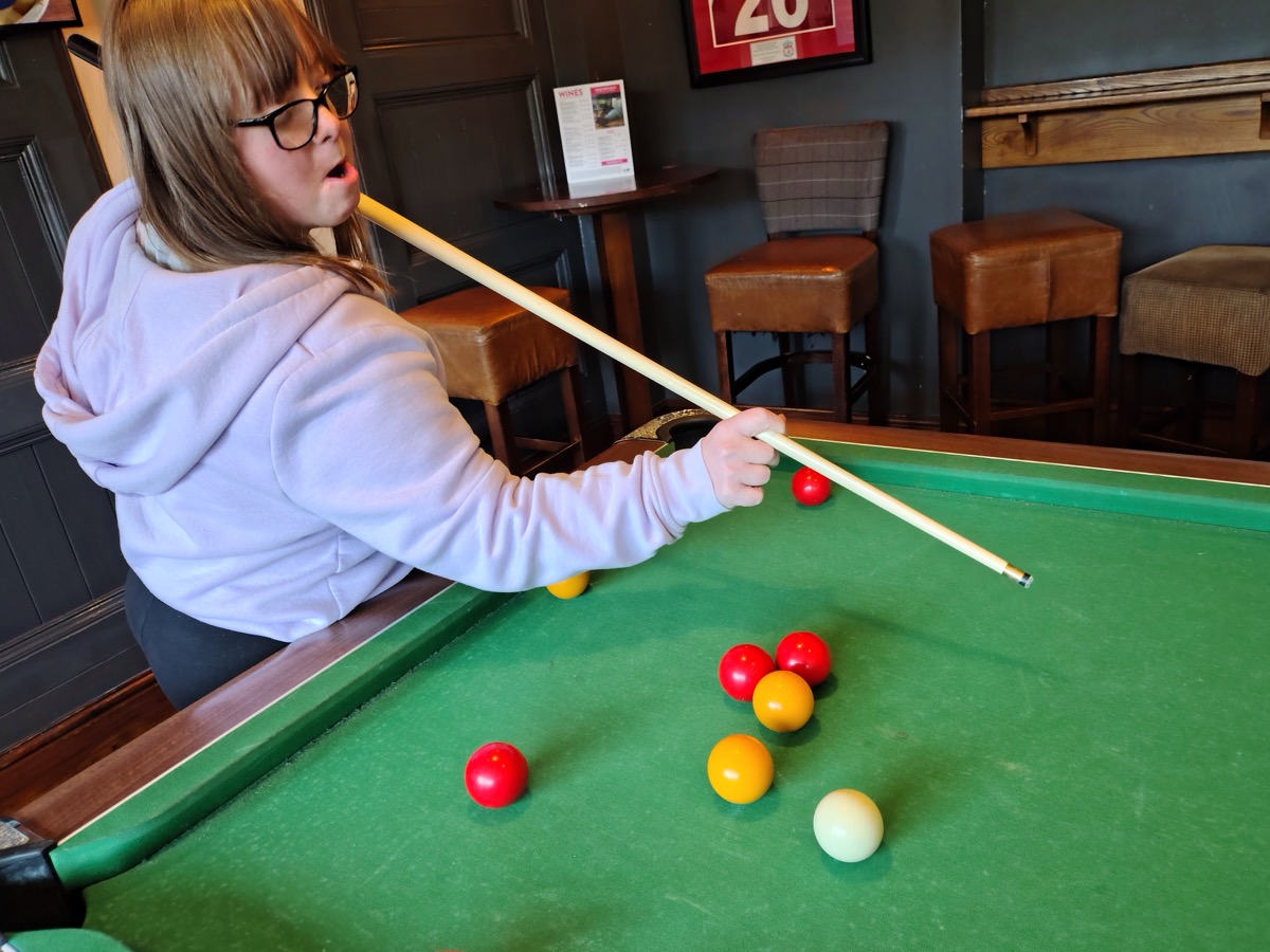 Playing pool at the pub